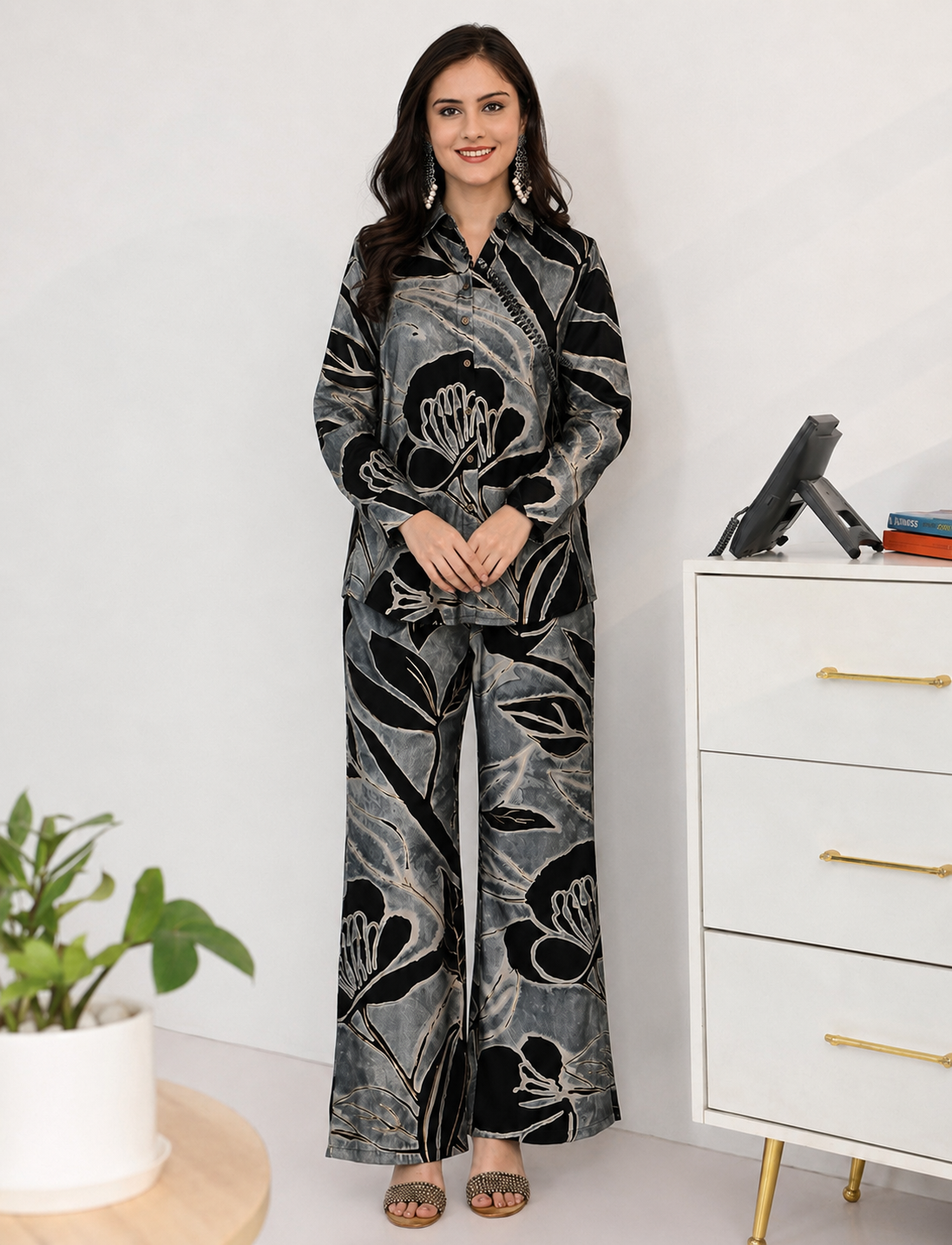Woman wearing Black Floral Printed co-ord set, front view, shirt and pants