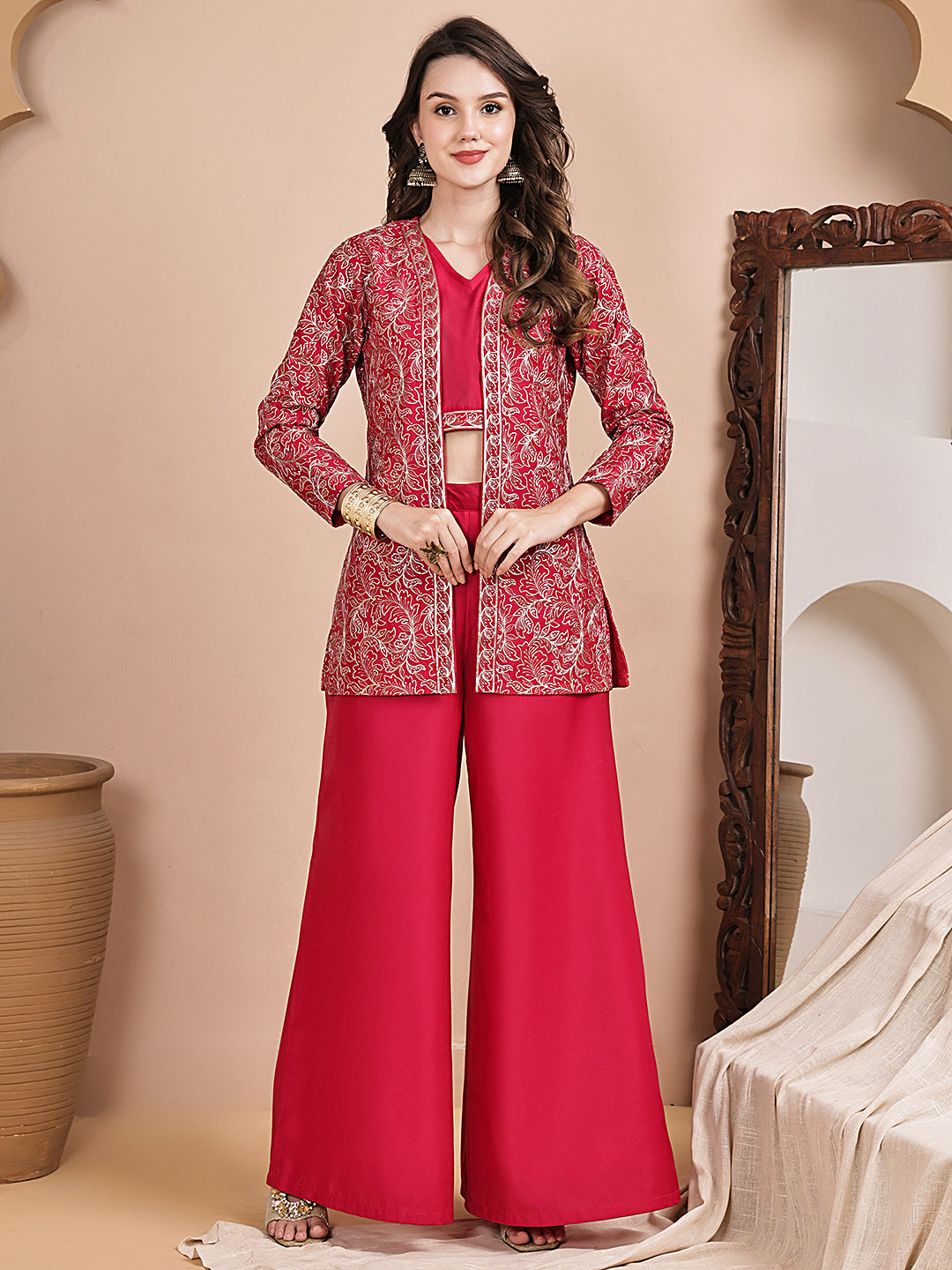Woman wearing pink embroidered jacket co-ord set