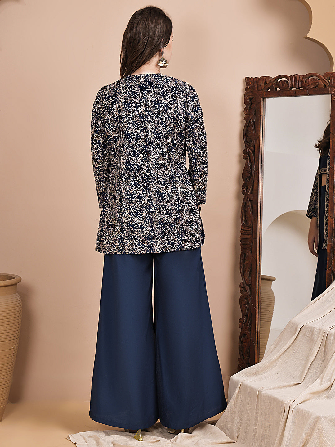 Back view of model styling blue co-ord outfit