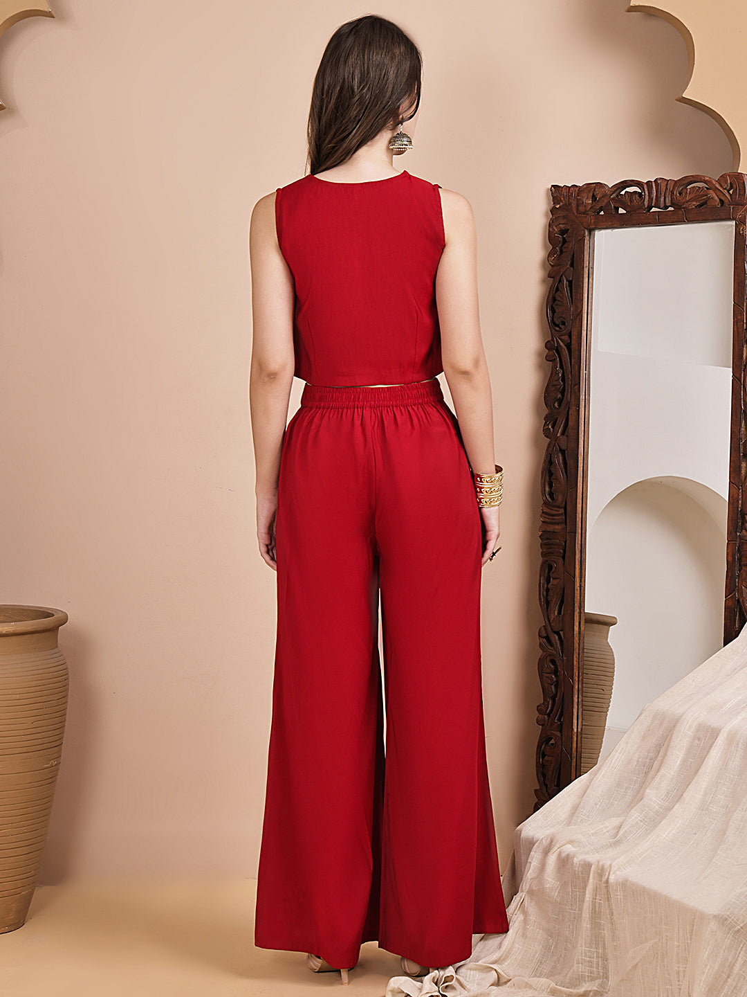 Back view of model styling red co-ord outfit