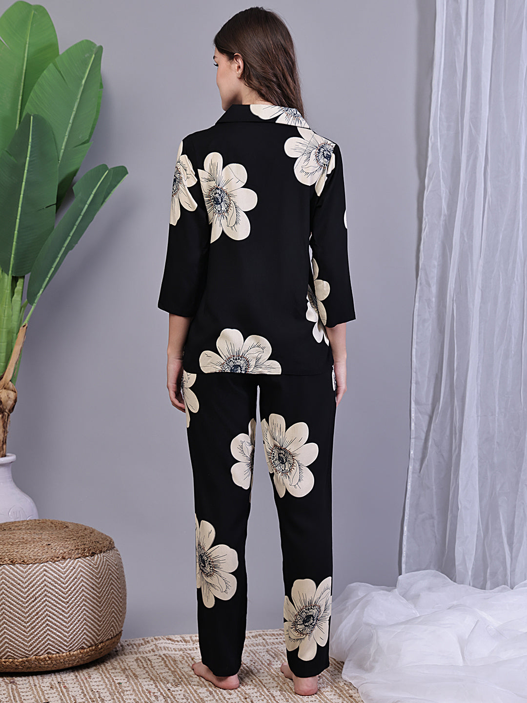 Back view of model in Black Printed Night Suit