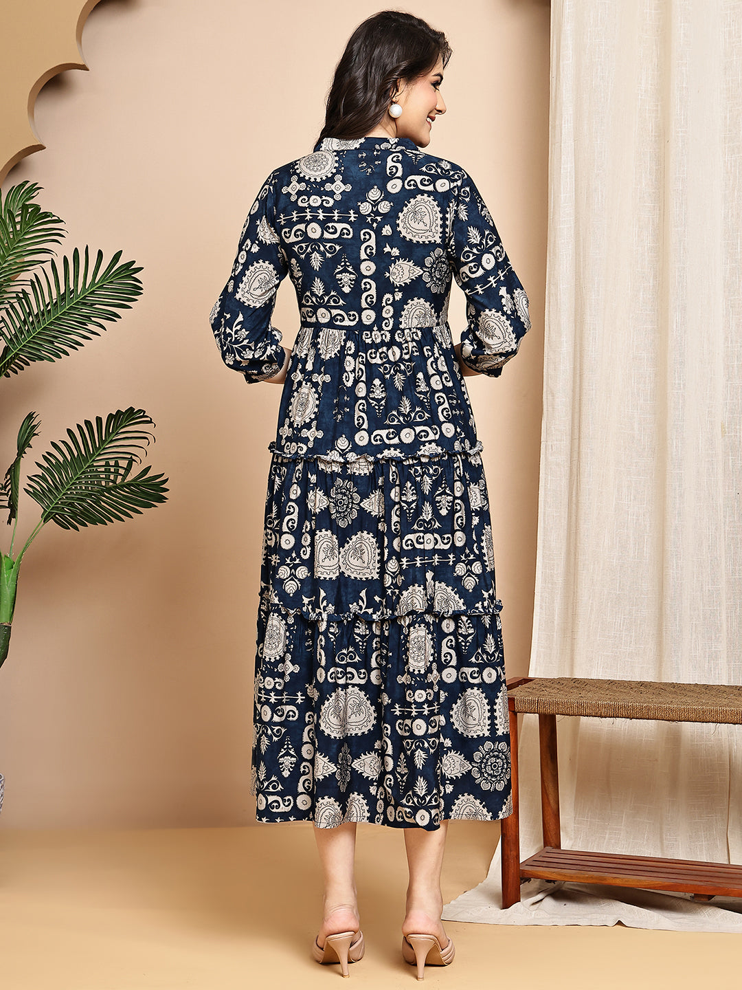 Back view of model in navy blue printed Chanderi dress