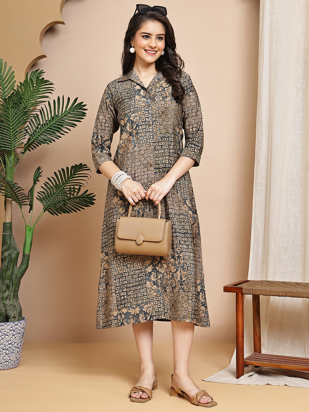 Close-up of chanderi fabric on grey dresses for women