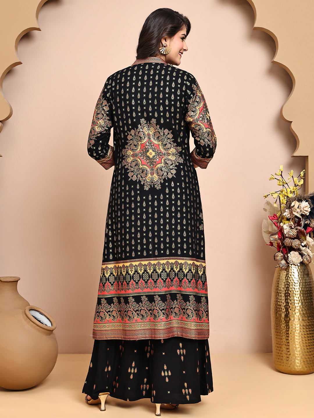 Back view of a model styling the black ethnic co-ord outfit