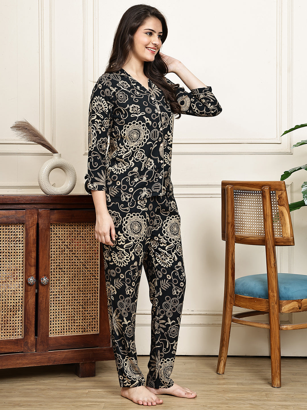 Black viscose rayon night suit with short sleeves and pyjamas.