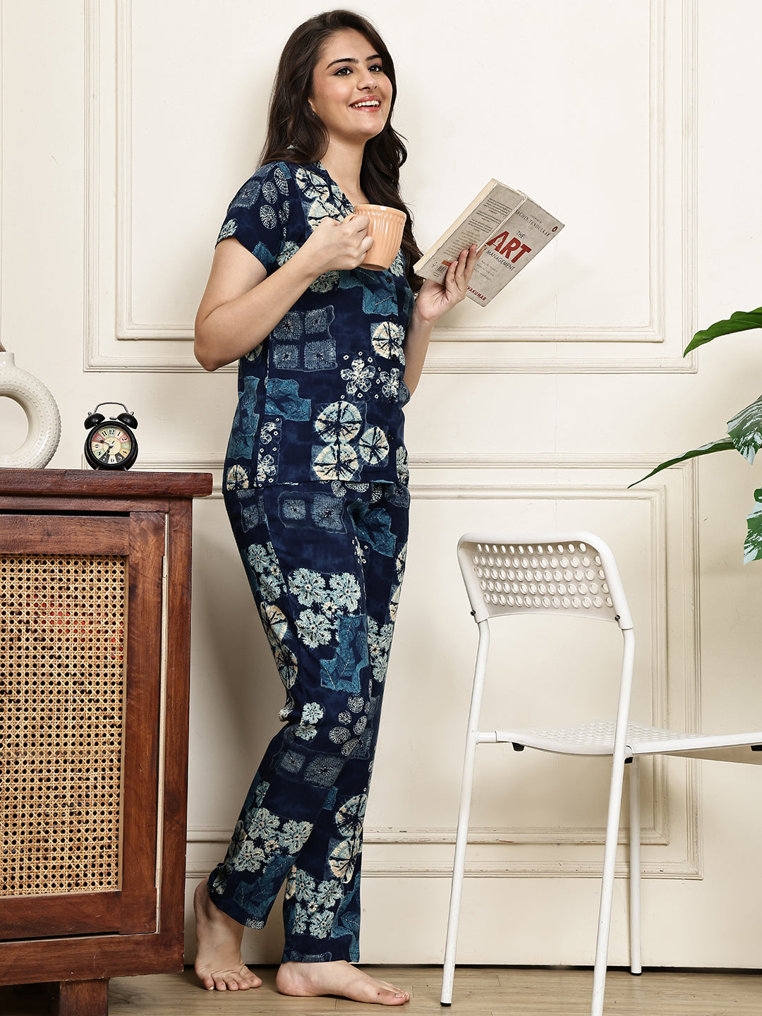 Lifestyle shot of a floral cotton night suit for women