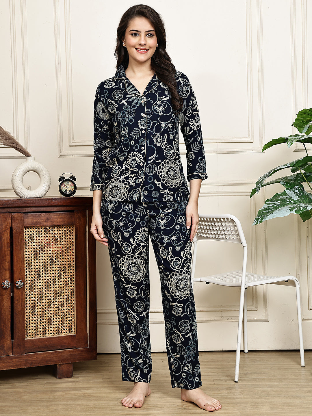 Woman wearing a black ethnic print night suit