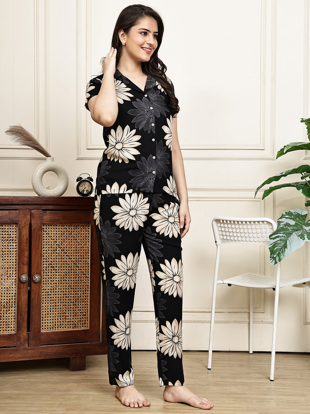 Black viscose rayon night suit with a notched collar and matching pyjamas