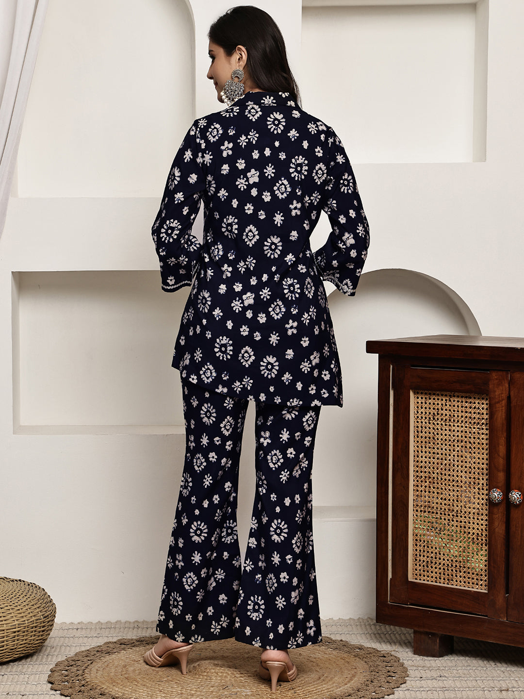 Back view of model styling Navy Blue floral co-ord outfit