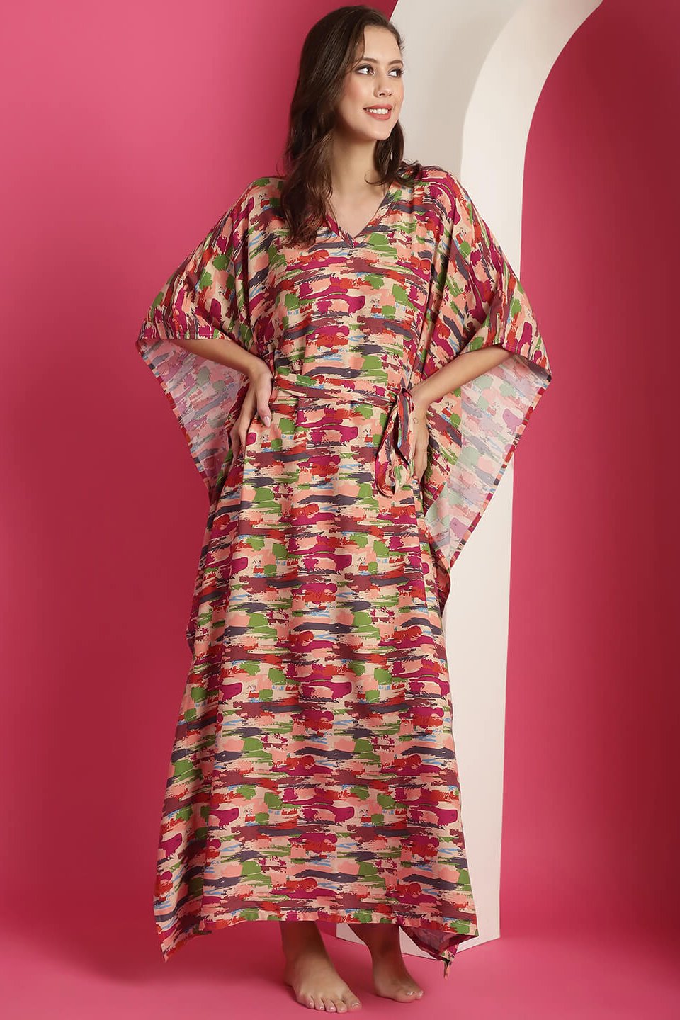 Woman wearing red and green abstract printed Kaftan Dress