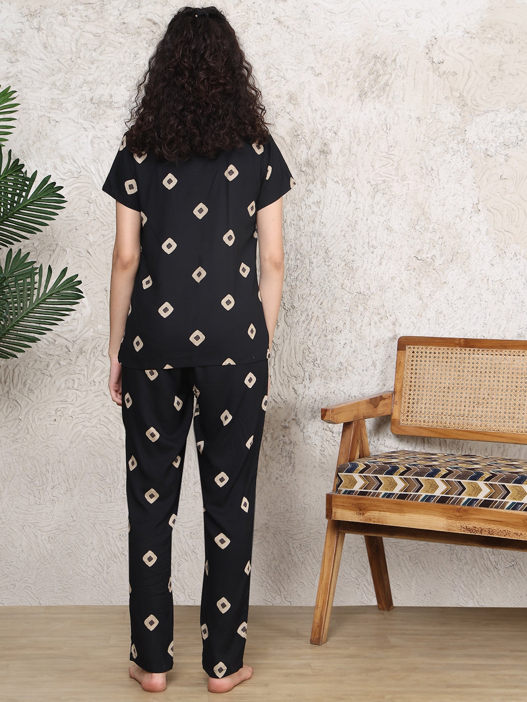 Back view of model in Black Abstract Printed Night Suit