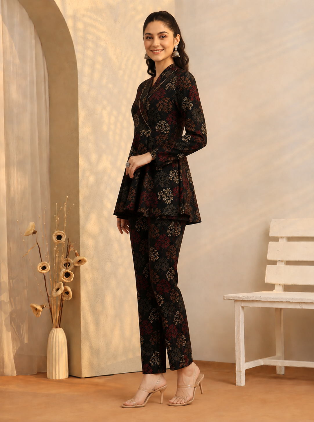 Woman in Black Abstract co-ord set, side profile, shirt and pants