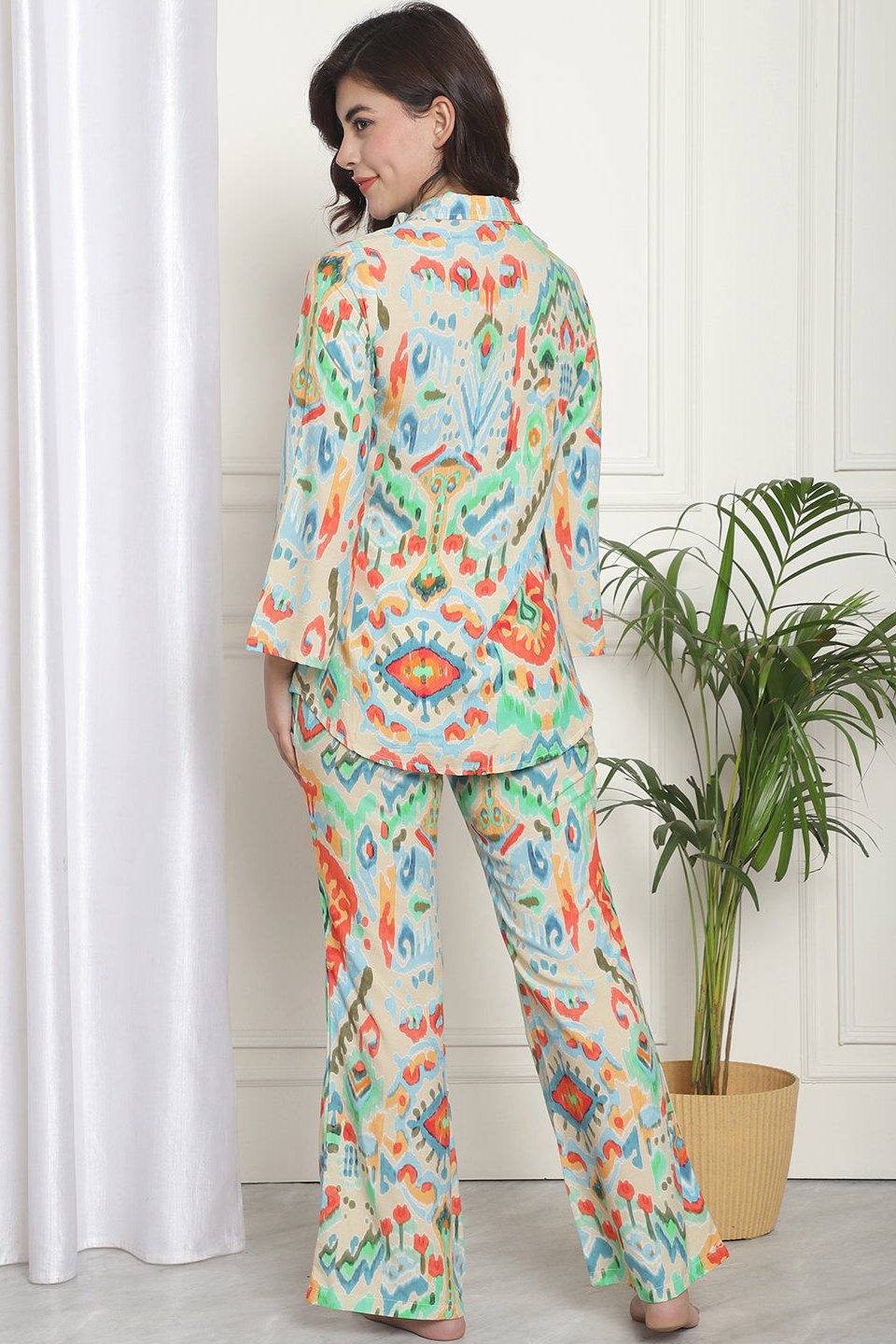 Back view of model in Beige Printed Night Suit