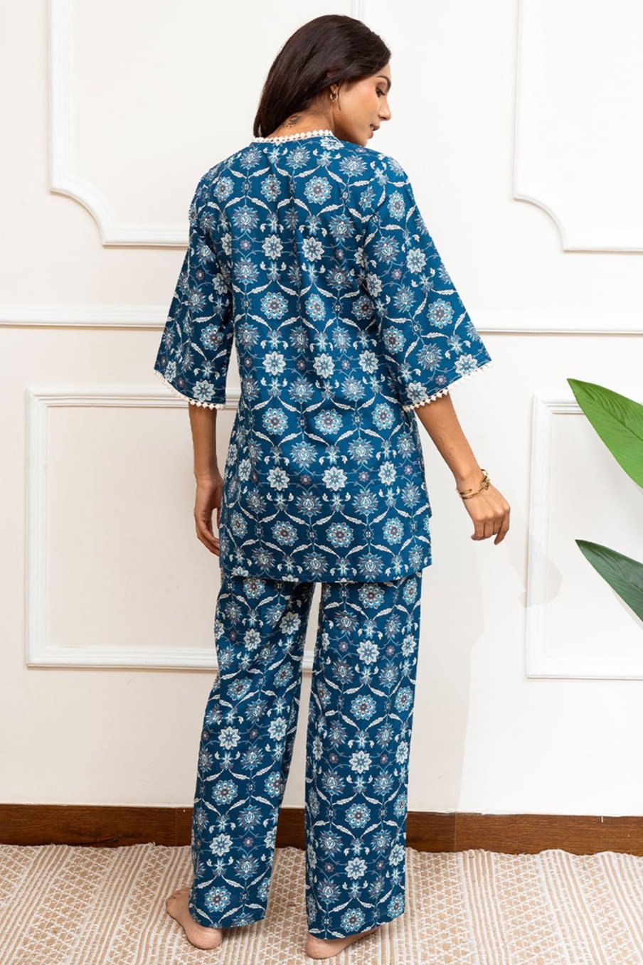 Back view of model styling Blue floral co-ord outfit