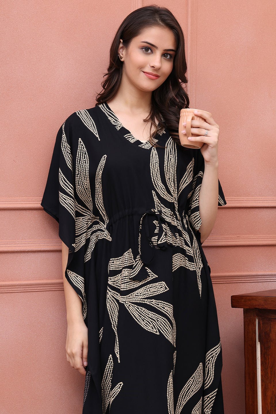 Close-up of viscose rayon fabric on black Kaftan Dress
