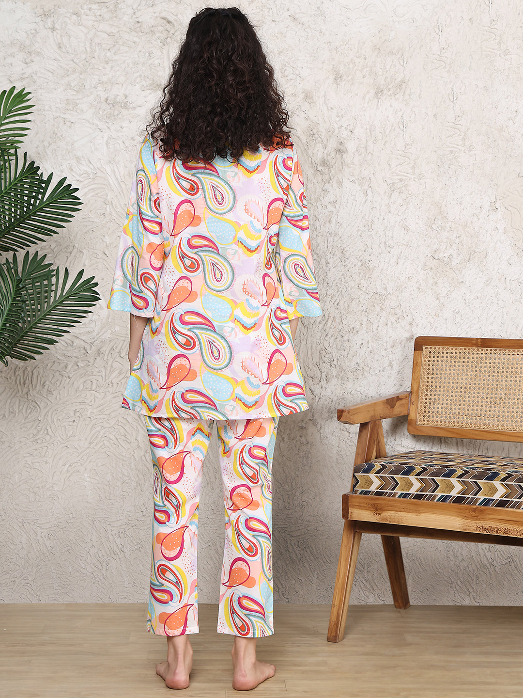 Back view of a model in the multi-colour printed night suit