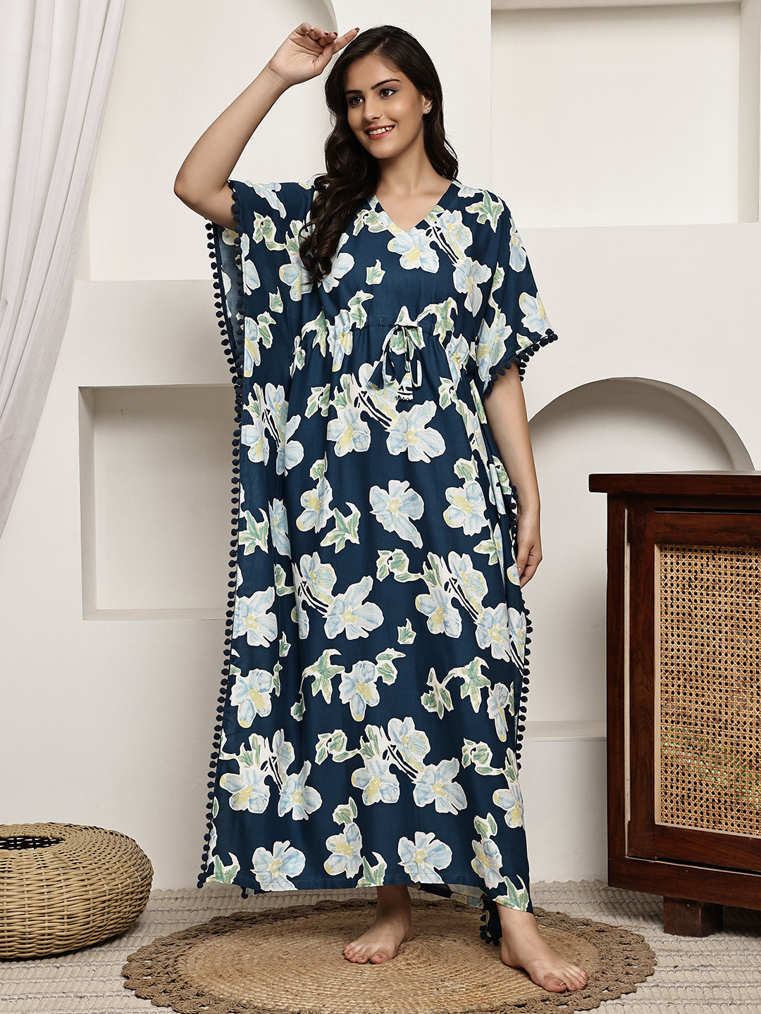 Close-up of viscose rayon fabric on blue floral Kaftan Dress