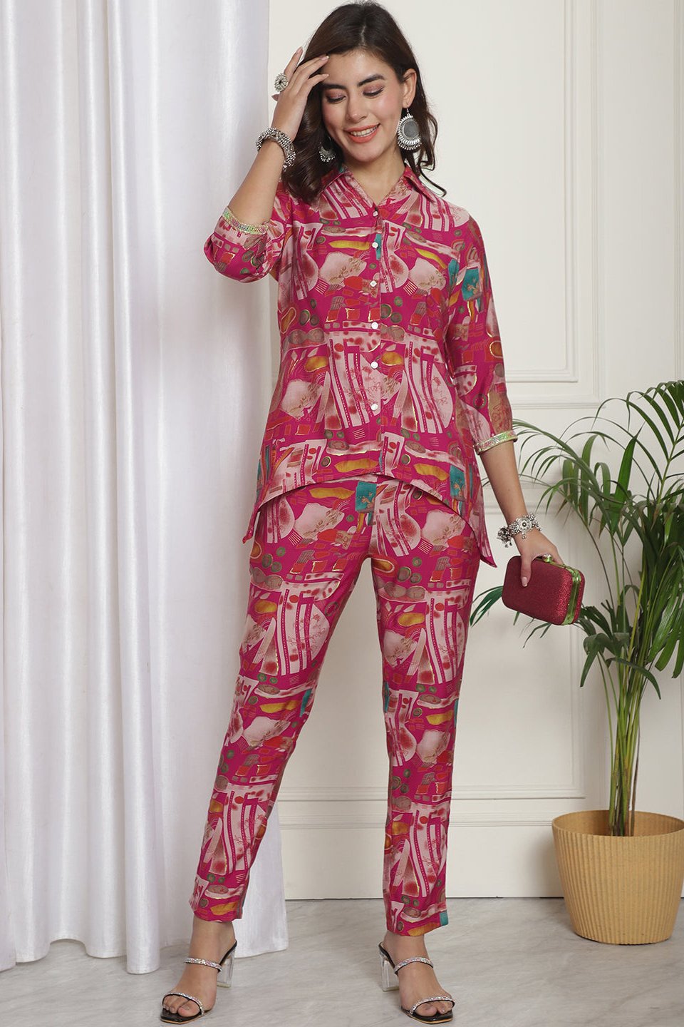 Woman wearing a pink abstract printed co-ord set