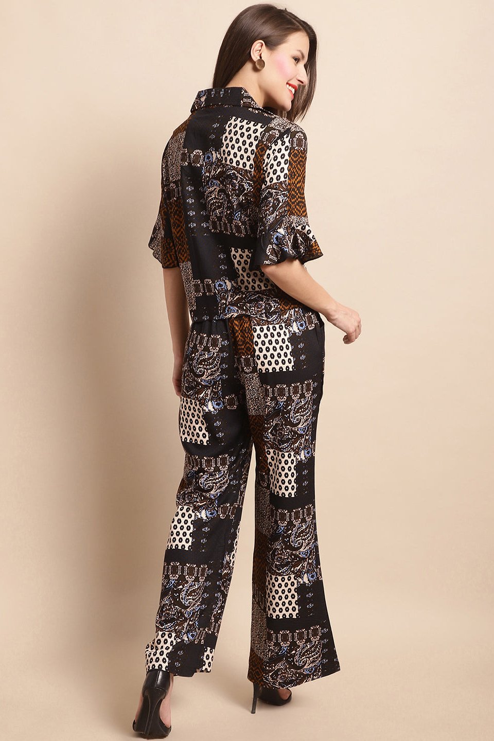 Back view of model styling Black & White co-ord outfit