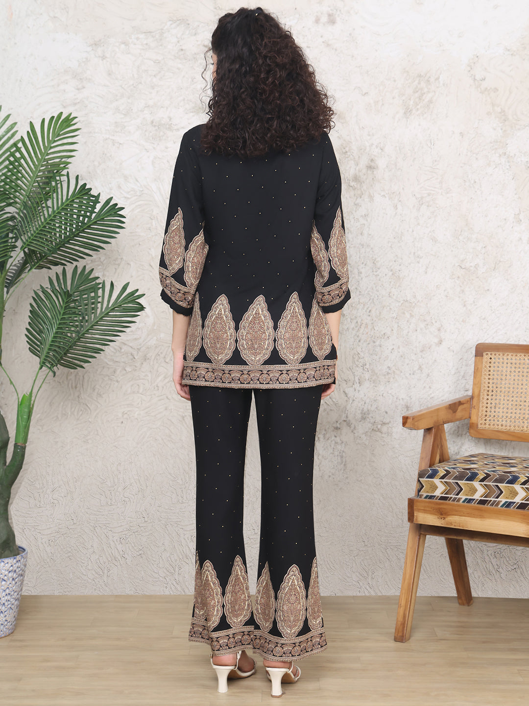 Back view of model styling Black co-ord outfit