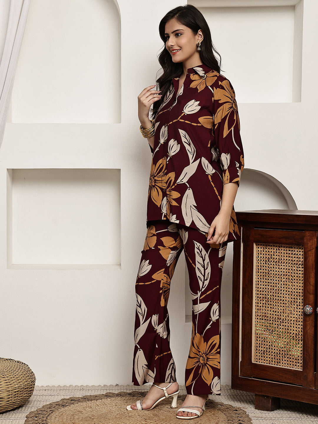 Back view of model styling Maroon floral co-ord outfit