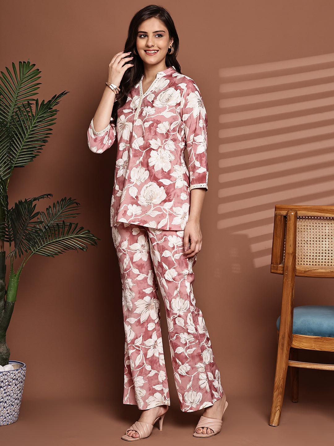 Back view of model styling Pink floral co-ord outfit