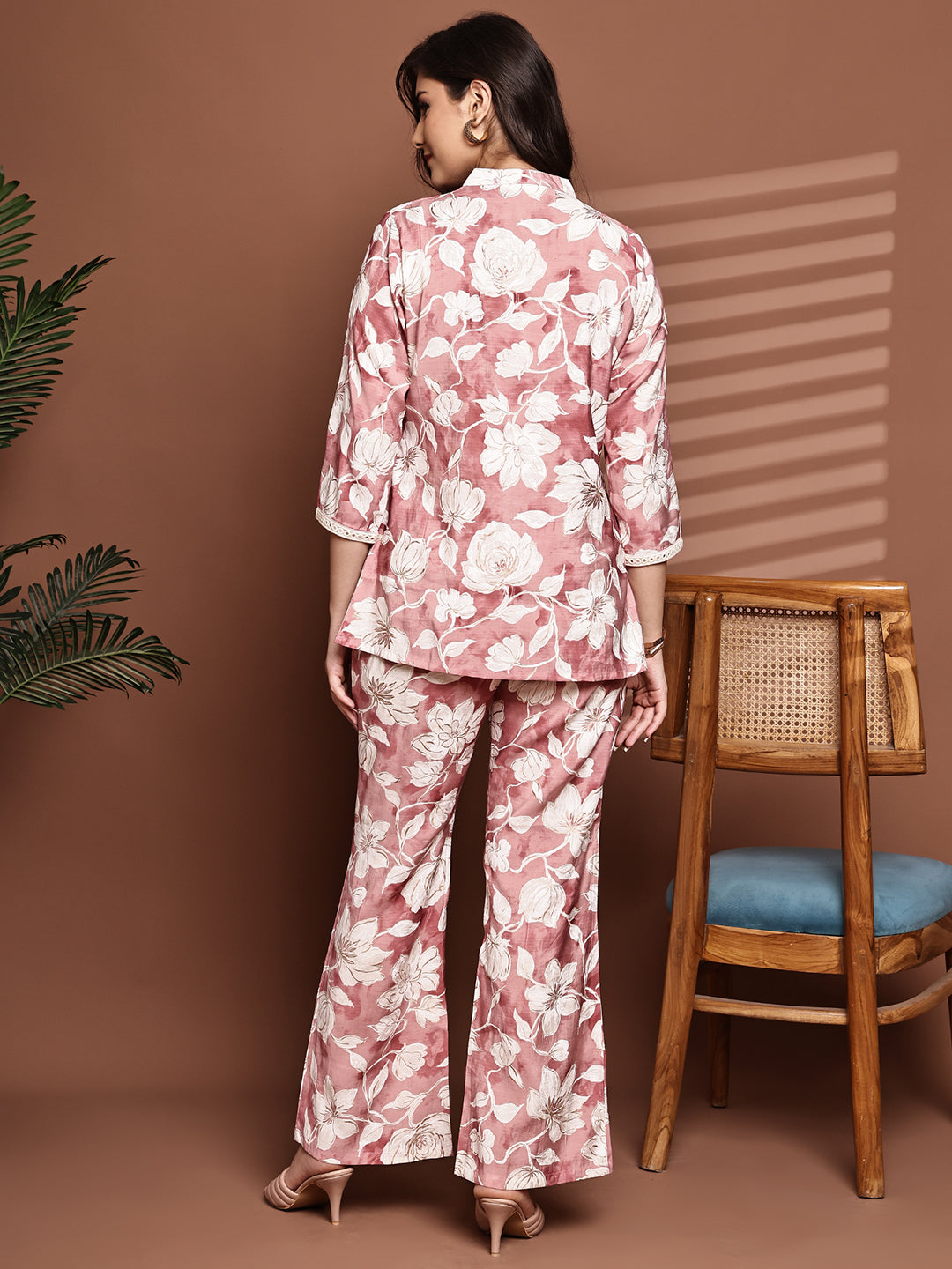 Back view of model styling Pink floral co-ord outfit