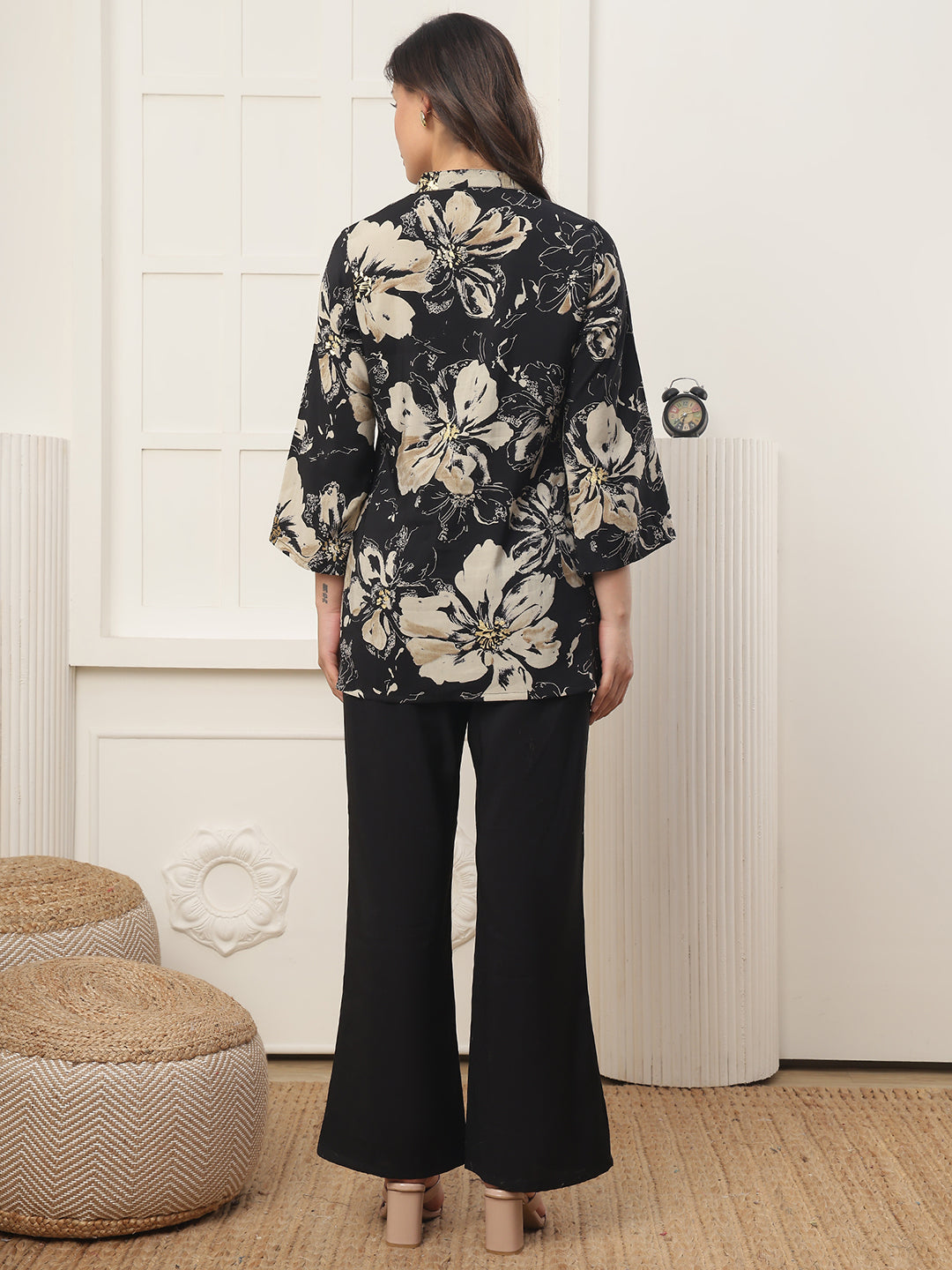 Back view of model styling Black floral co-ord outfit