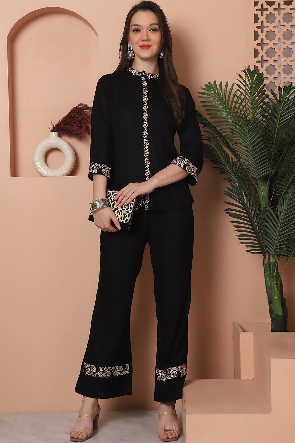 Back view of model styling Black co-ord outfit