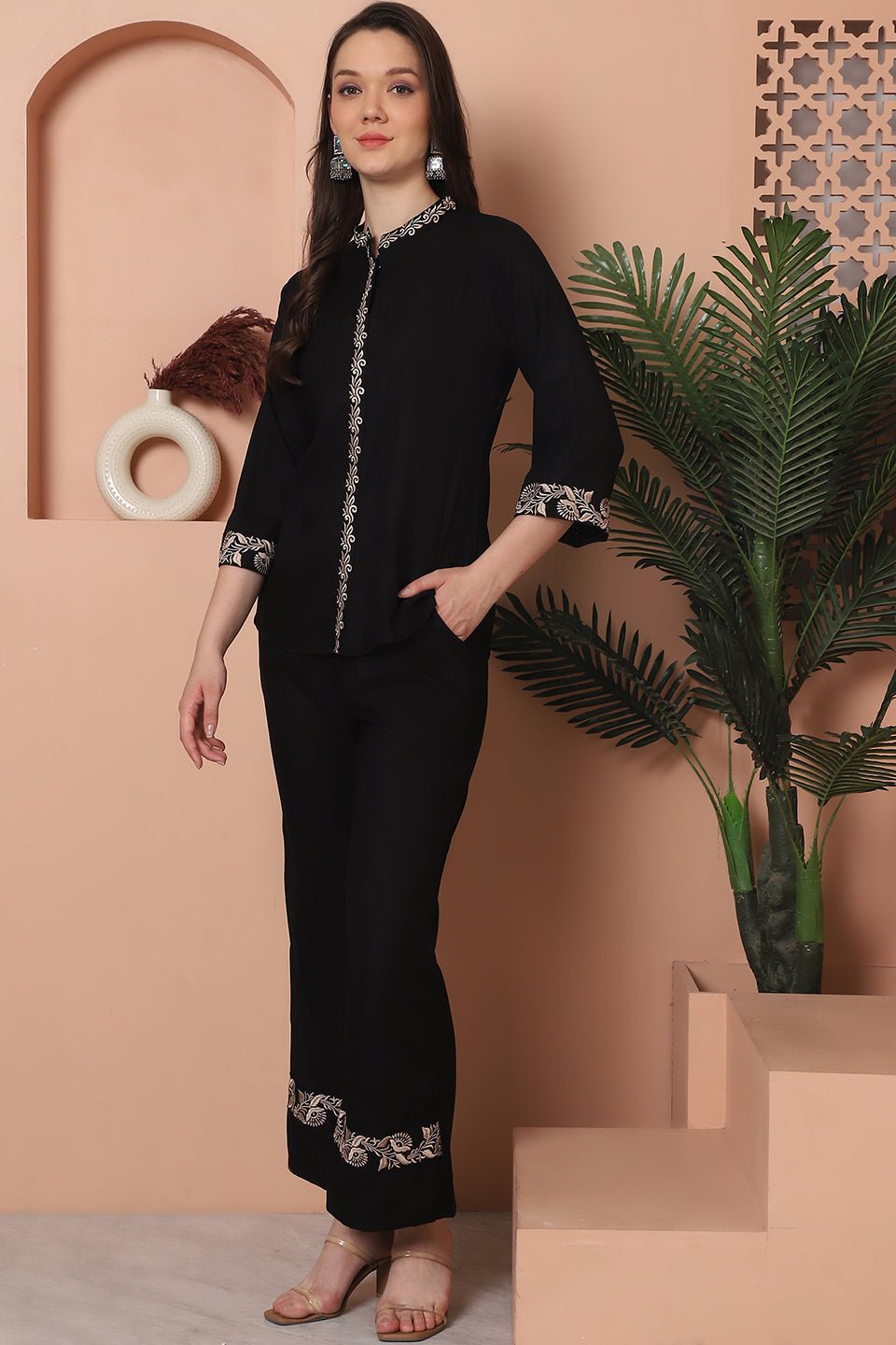 Back view of model styling Black co-ord outfit