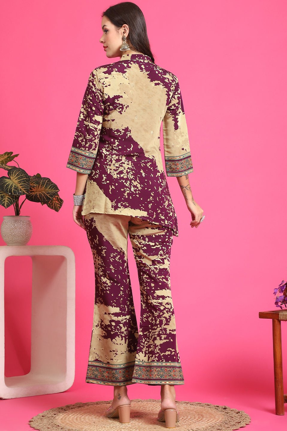 Back view of model styling rich Purple co-ord outfit