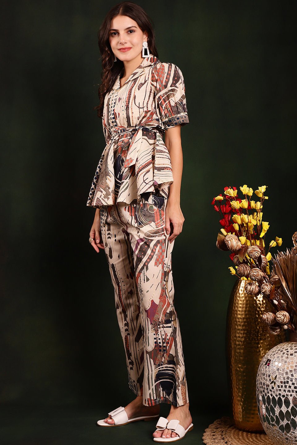 Cream co-ord set with short-sleeve top and matching bottoms.