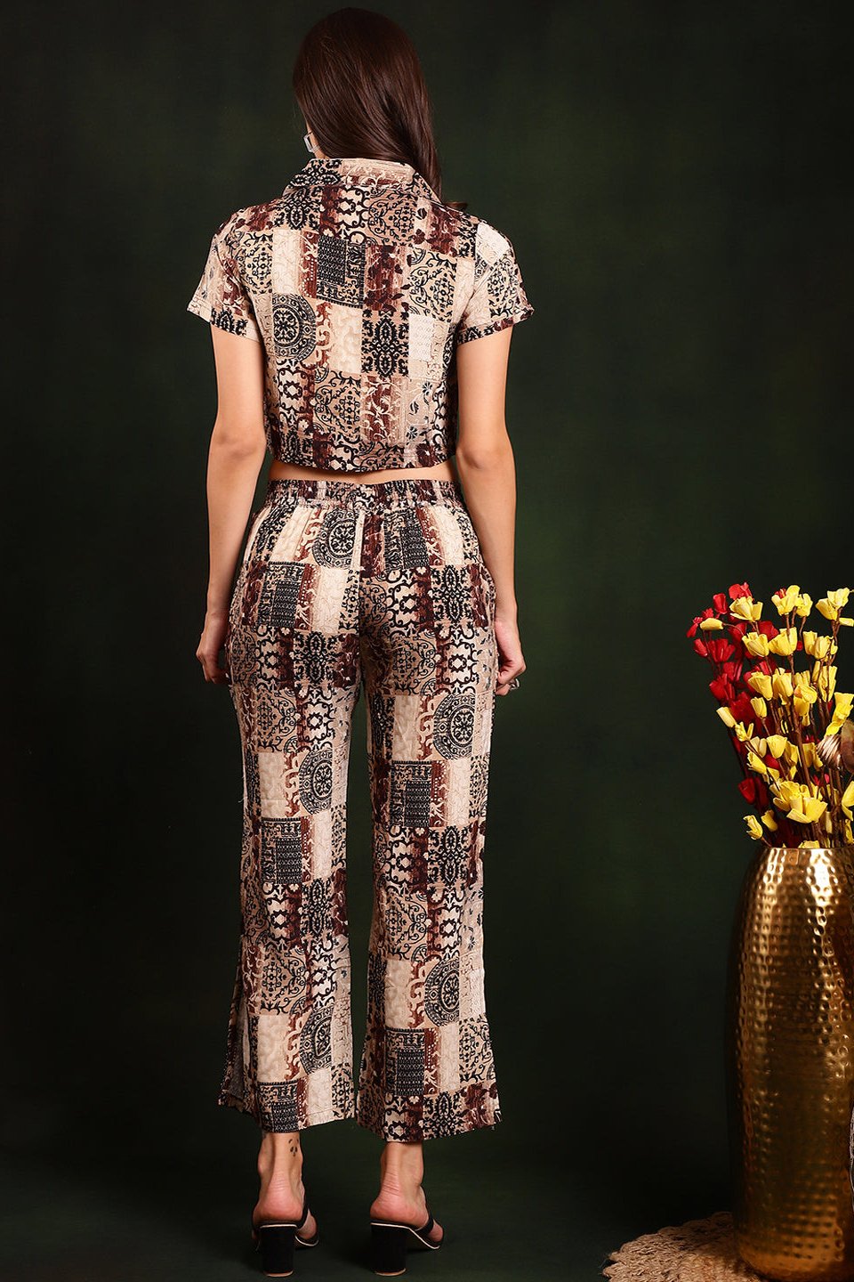 Back view of a model styling the brown abstract co-ord outfit.