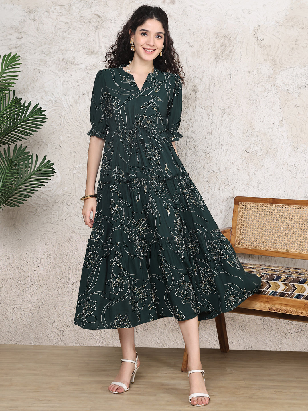 Woman wearing green floral printed Chanderi dress