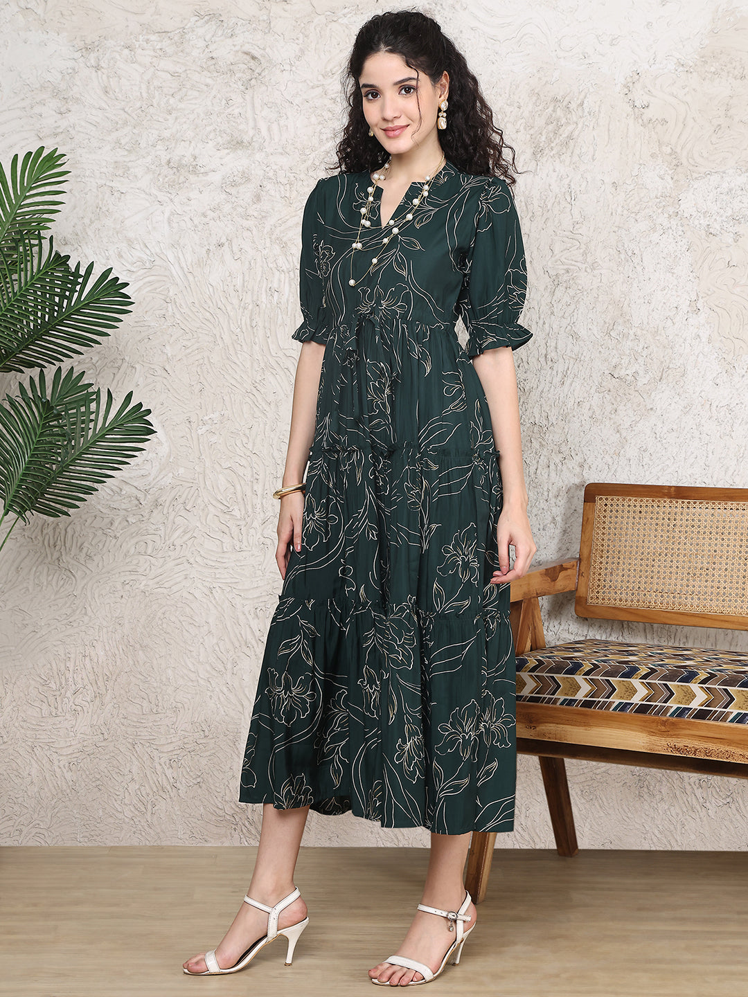 Close-up of Chanderi fabric detail on green dresses for women