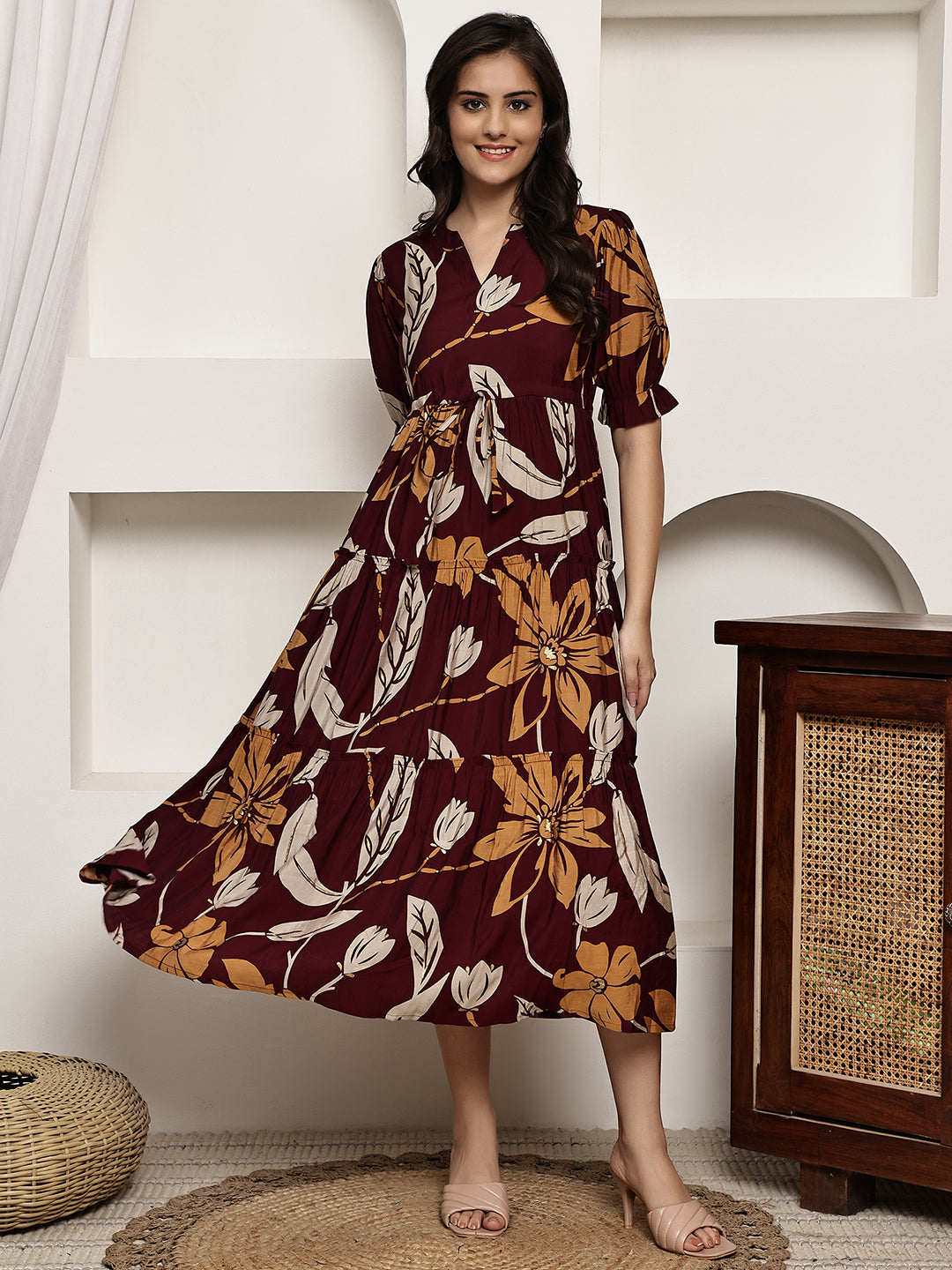 Close-up of Chanderi fabric detail on maroon dresses for women