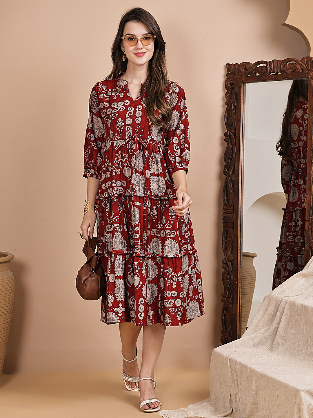 Close-up of Chanderi silk fabric on maroon Dresses for Women
