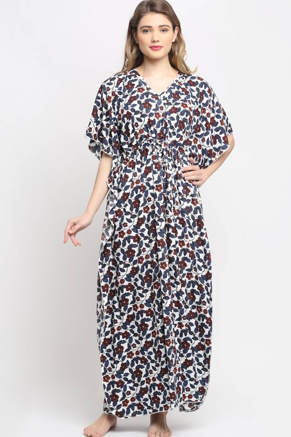 Woman wearing white and blue floral printed Kaftan Dress