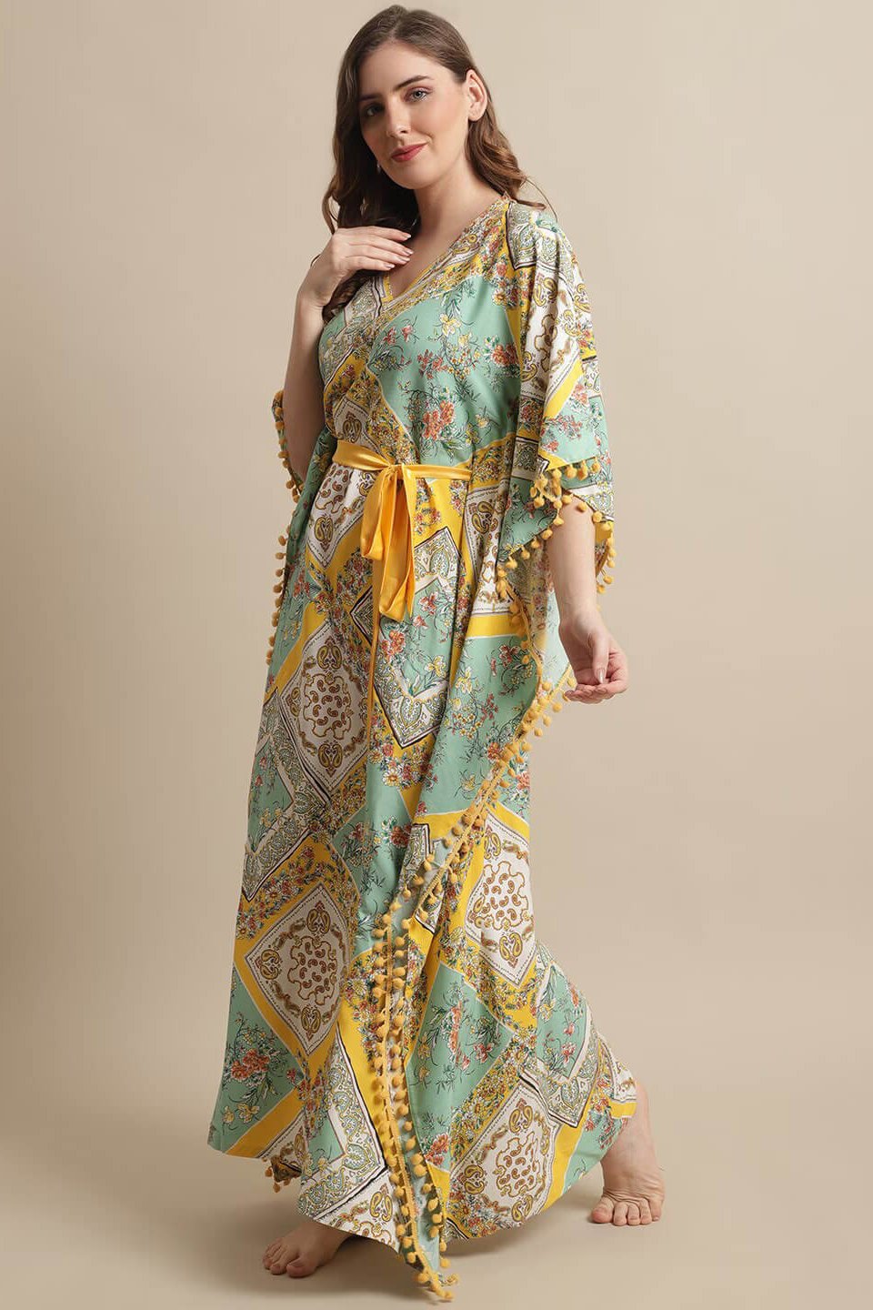 Woman wearing yellow floral Kaftan Dress