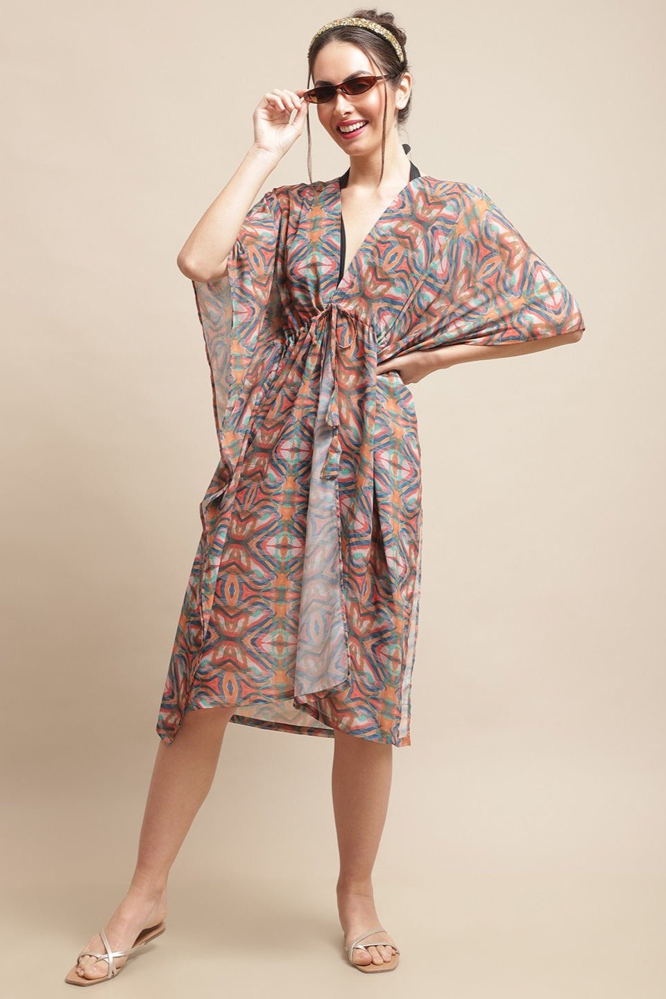 Woman wearing multi-color printed beach dress for women