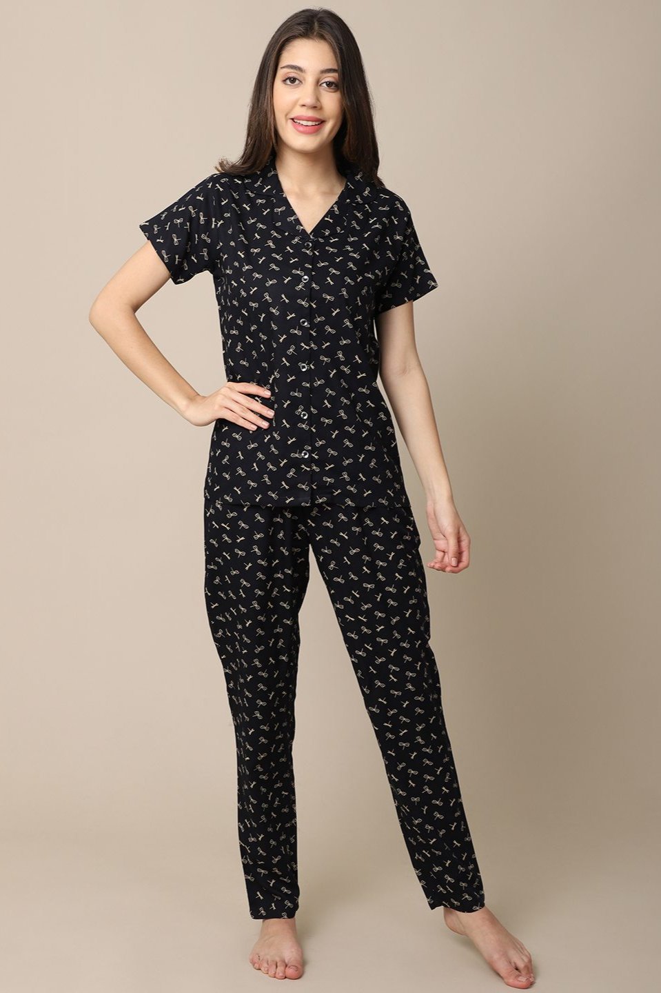 Woman wearing Black Printed Cotton Night Suit