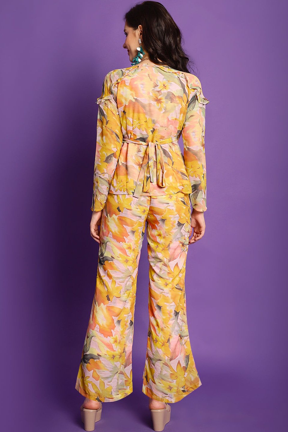 Back view of model styling Yellow floral co-ord outfit