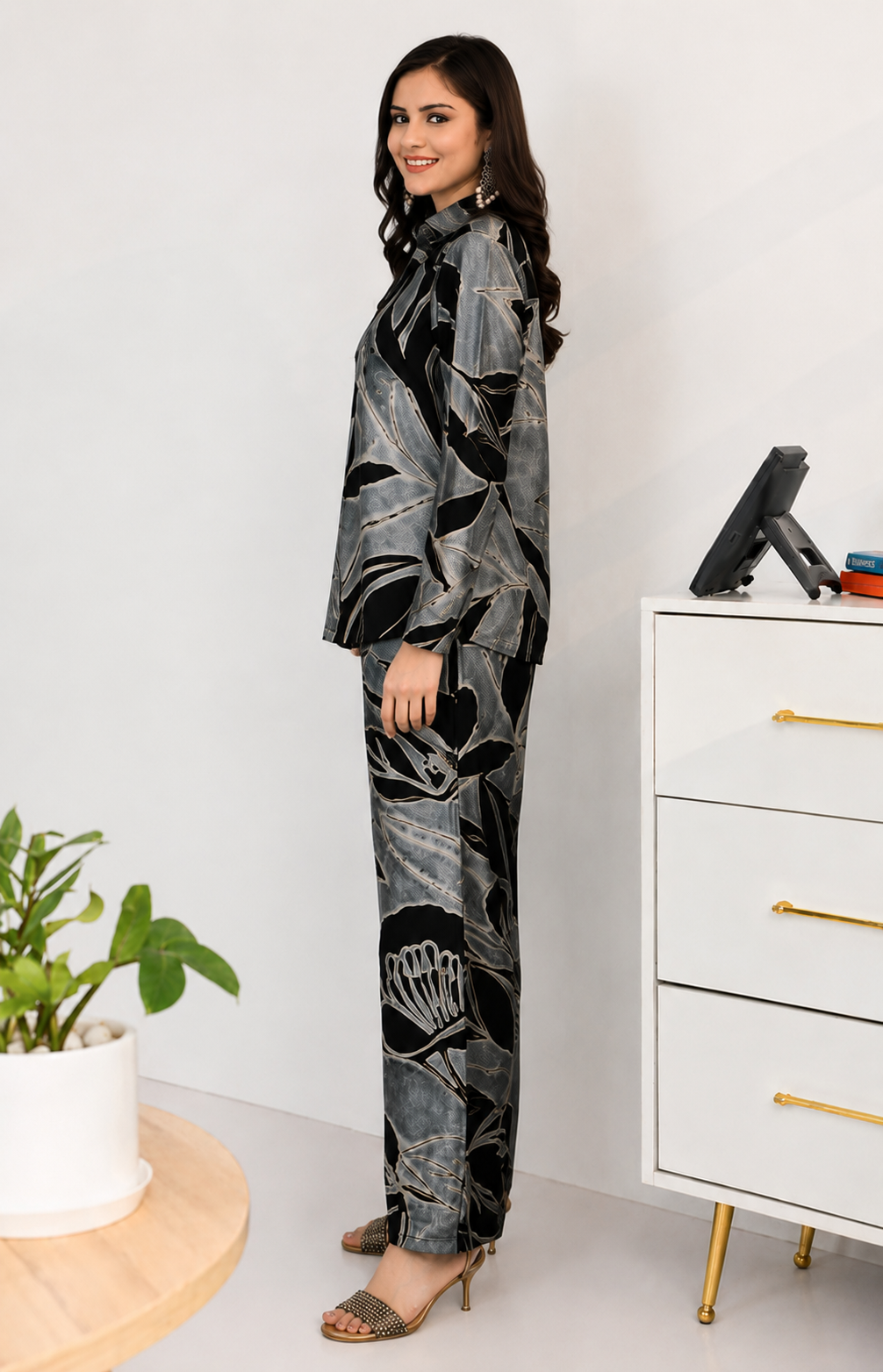 Back view of Black Floral Printed co-ord set for women, shirt and pants