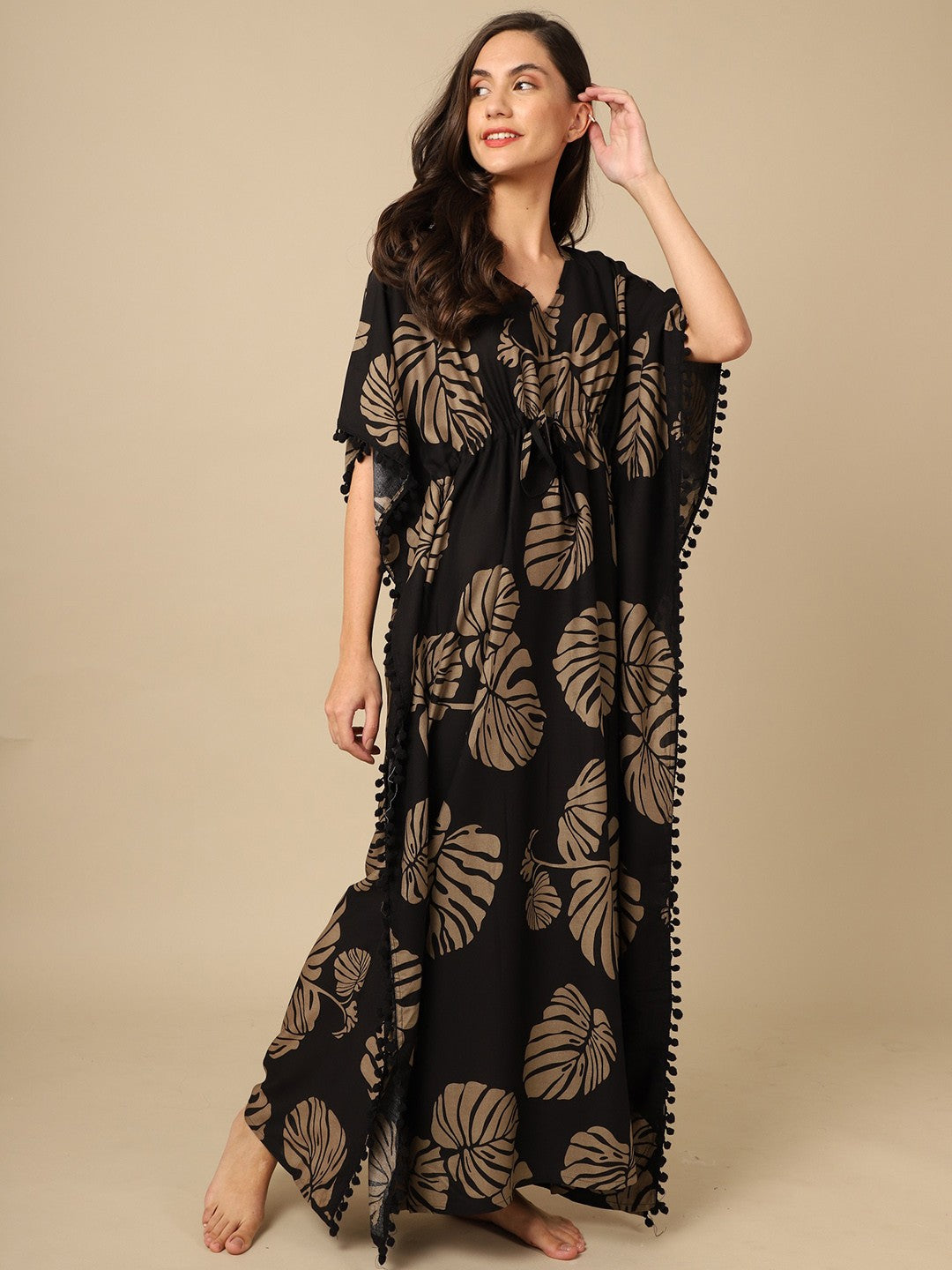 Woman wearing black floral printed Kaftan Dress