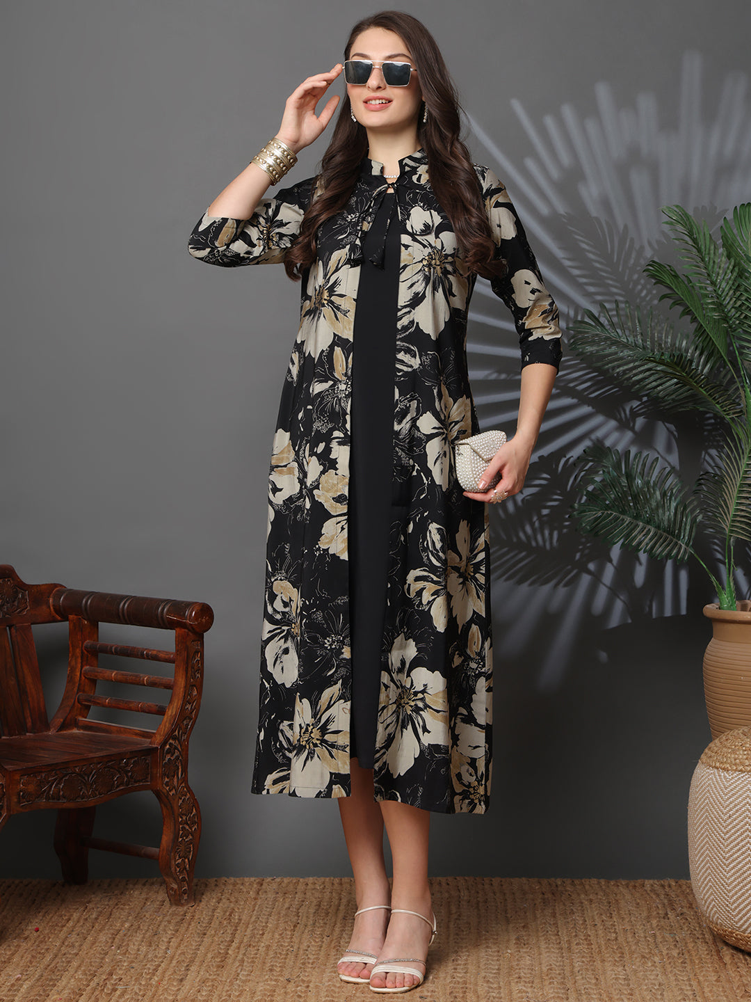 Woman wearing black floral dress 