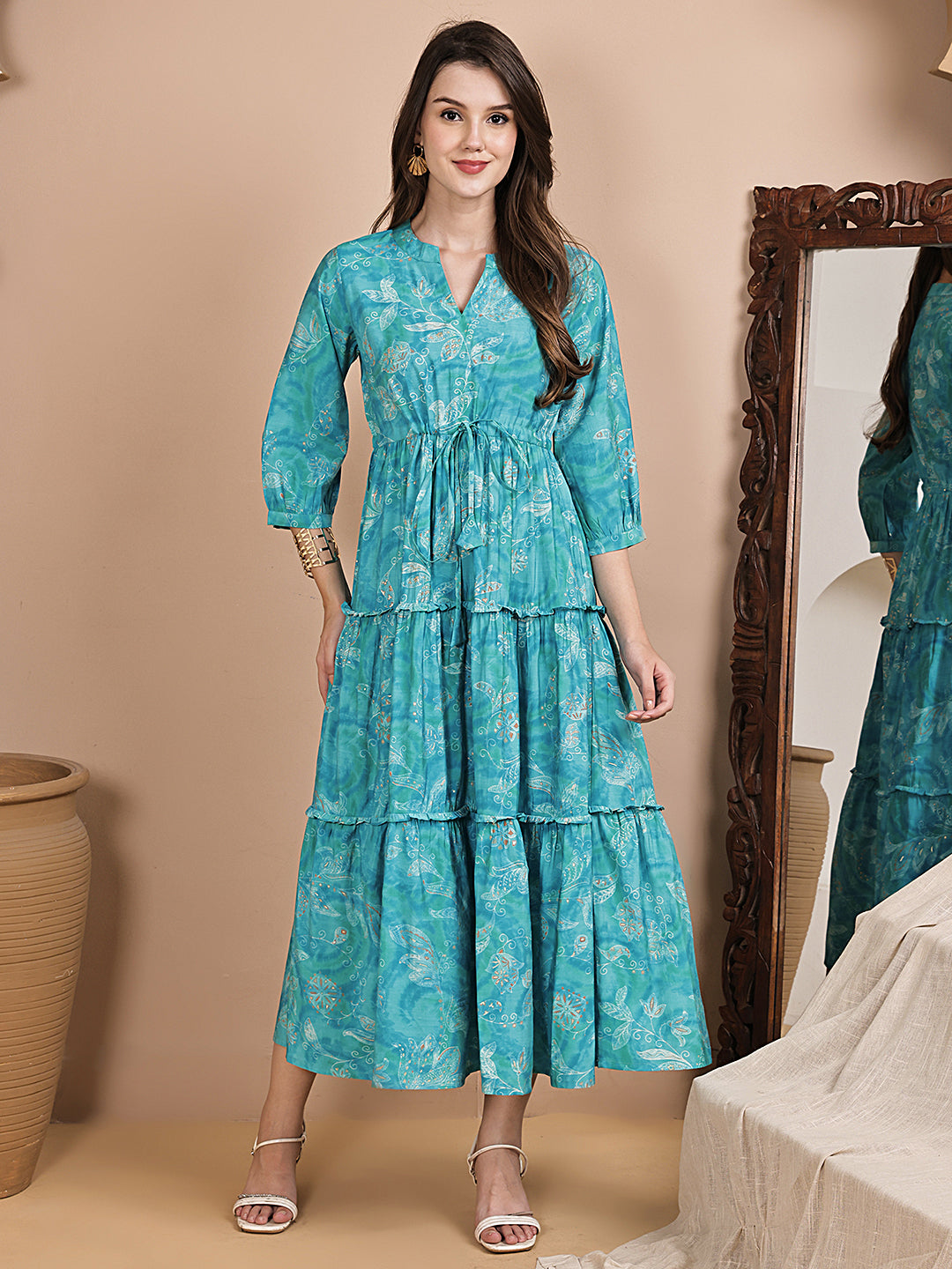 Woman wearing blue floral printed Chanderi silk dress