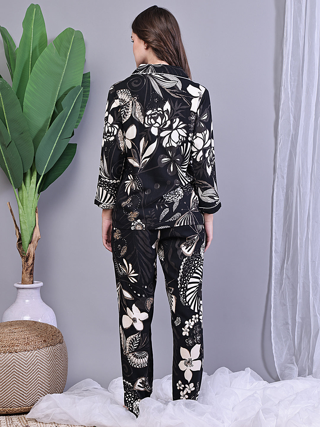 Back view of model in Black Printed Night Suit