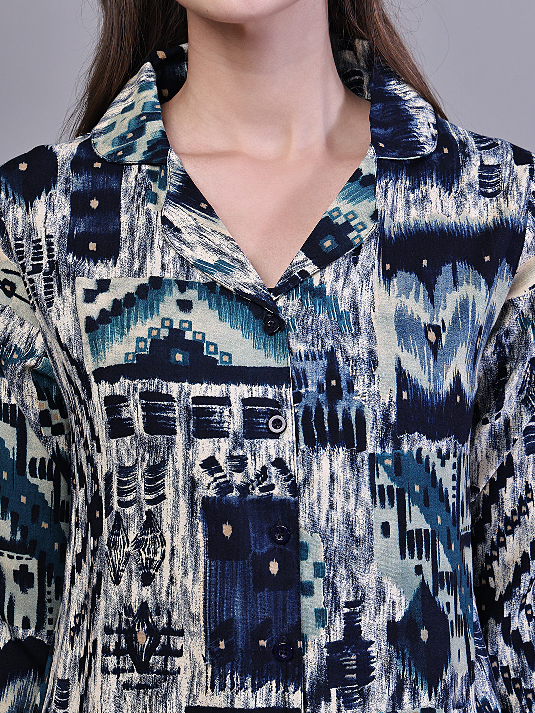 Lifestyle shot of Abstract Night Suit for Women relaxing