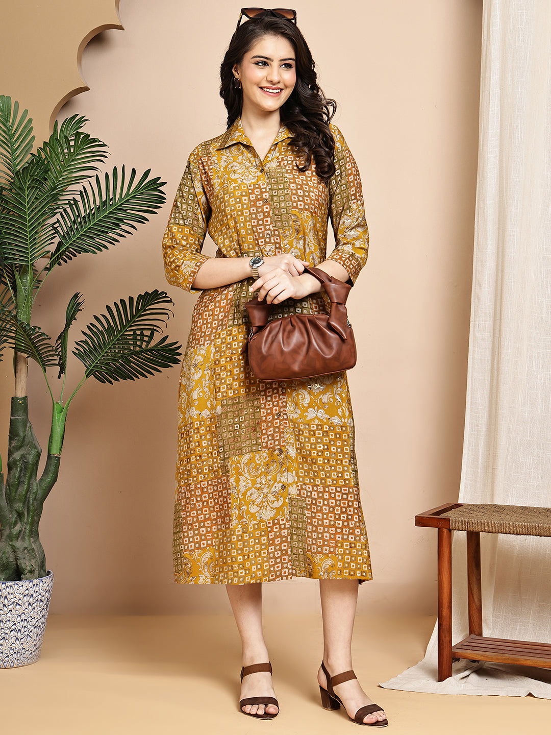 Close-up of Chanderi fabric on mustard dress for women