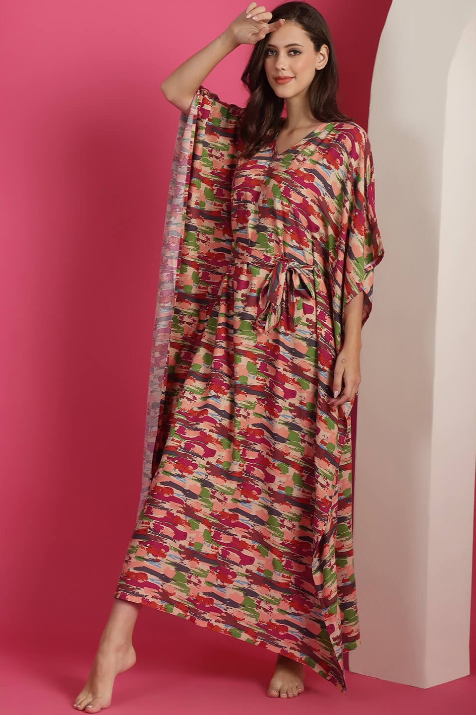 Close-up of soft rayon fabric on red and green Kaftan Dress
